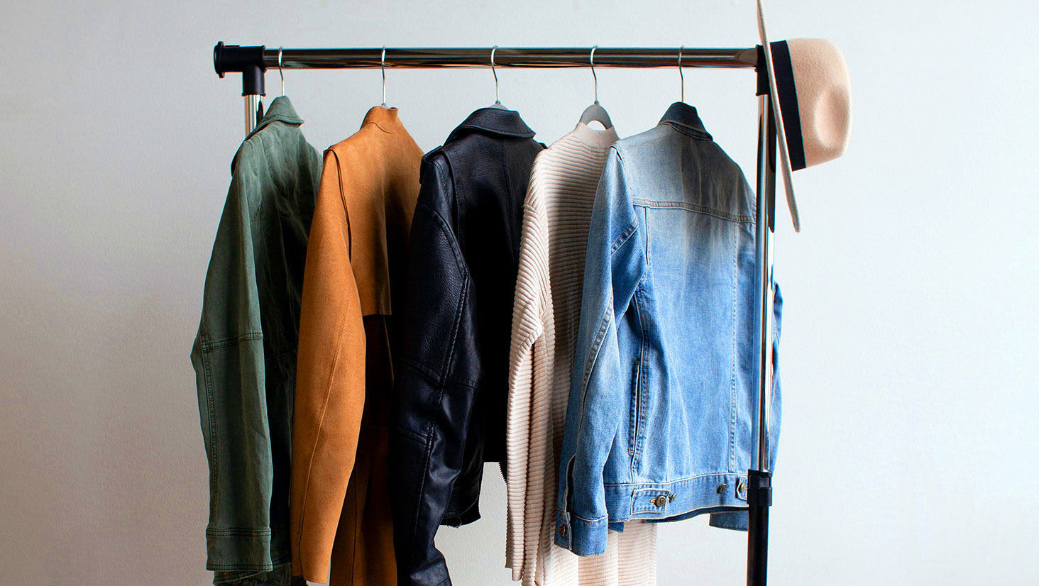 Clothes Hanging on Rail